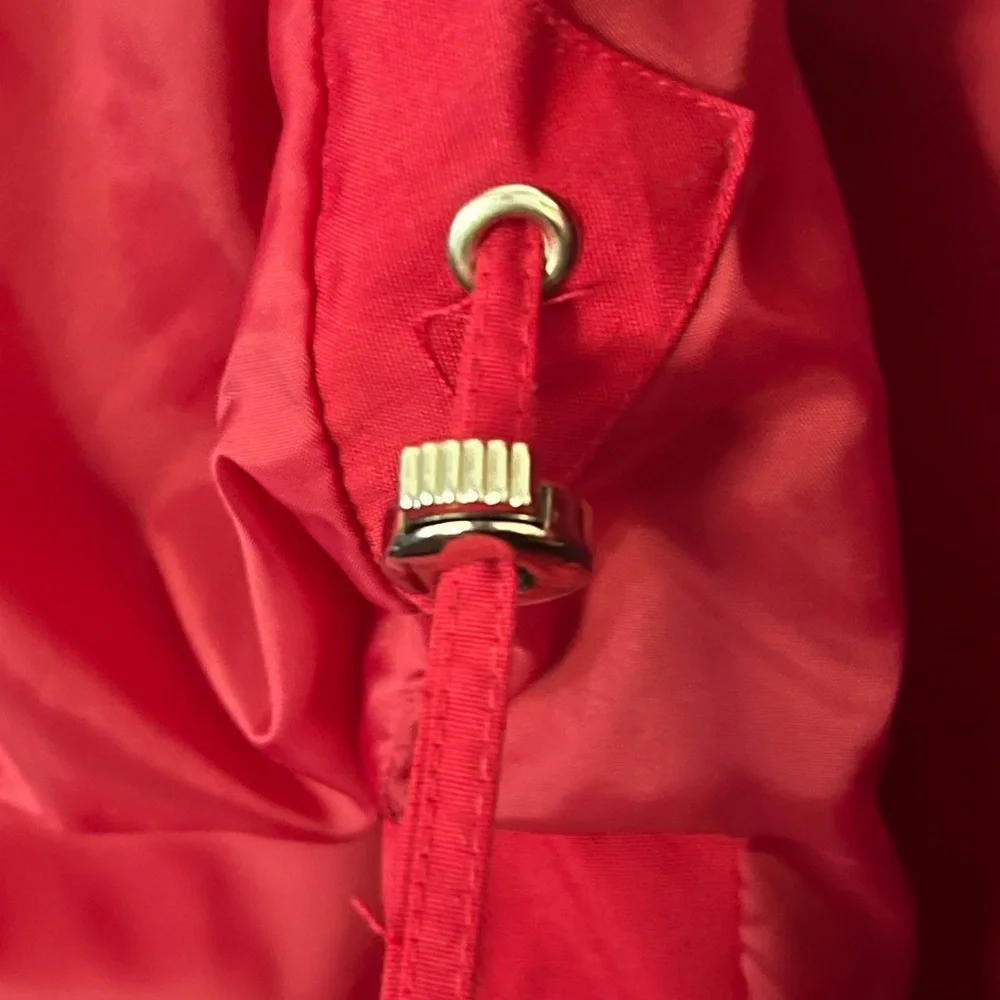 Red coat/jacket.Silver coloured adornments. Water repellent. Lined. Nautical - Picture 11 of 12
